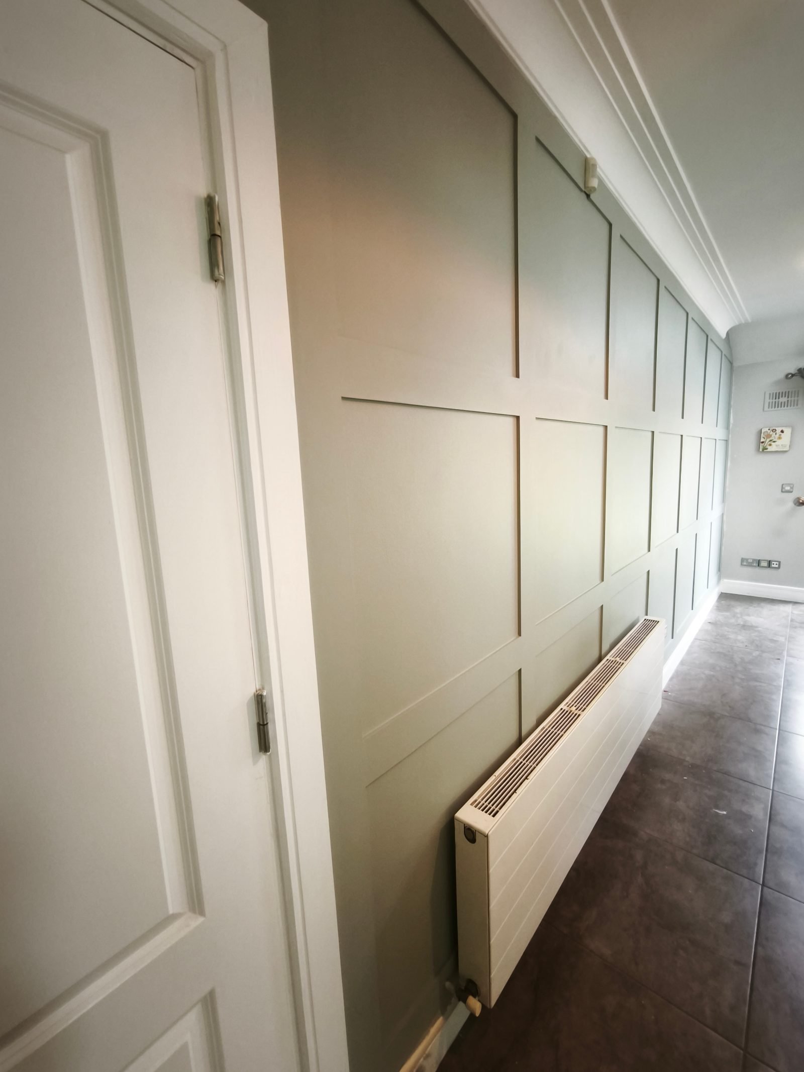 Sage panelled hallway