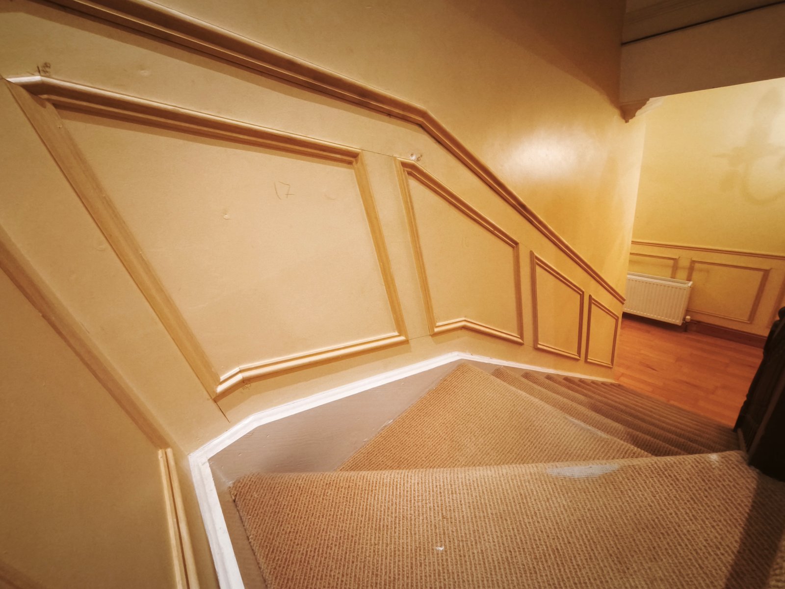 Shankill stairwell panelling, wide view