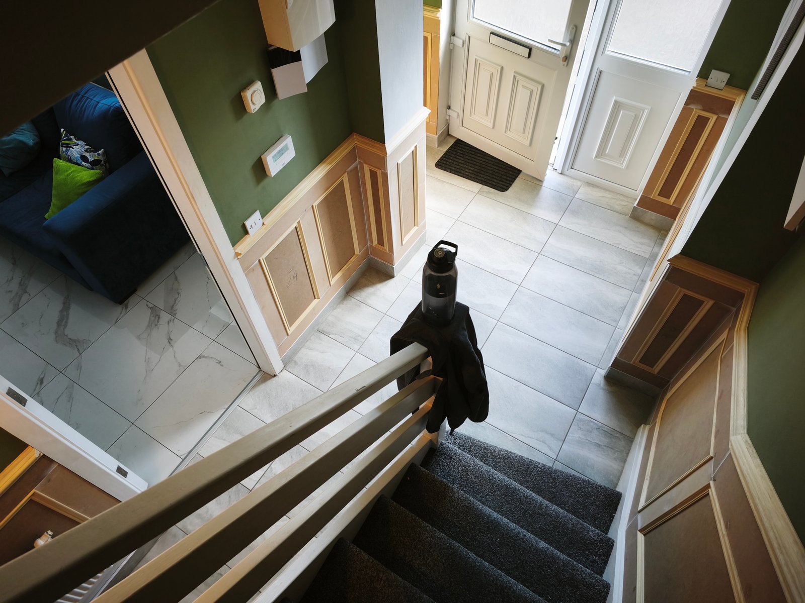 Wall covering panelling in a hallway entrance